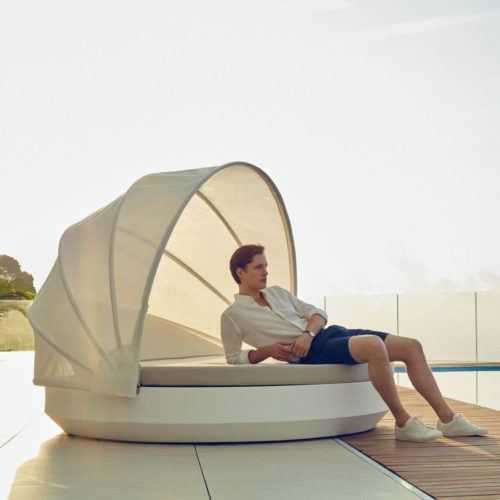 Vondom's basic Vela daybed with a parasol.