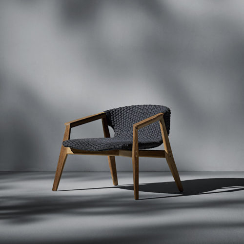 Ethimo's Knit collection lounge armchair.