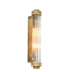 Wall Lamp Gascogne S by Eichholtz in vintage brass, gunmetal or nickel finish with a ribbed and bevelled clear glass shade
