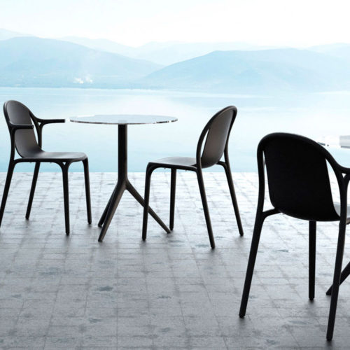 Brooklyn dining chairs by Vondom in use.