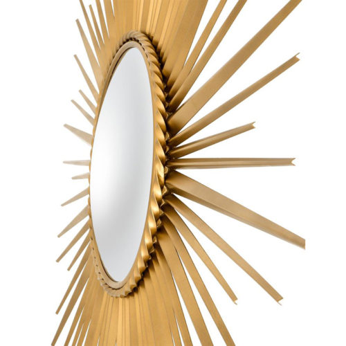 A close up side view of the Helios Mirror by Eichholtz.