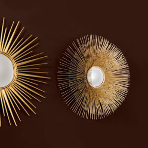 The Solaris Mirror L by Eichholtz on a black background.