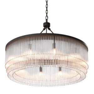 Chandelier Hector by Eichholtz with tiers of glass rods in a bronze highlight or light brushed brass or nickel finish