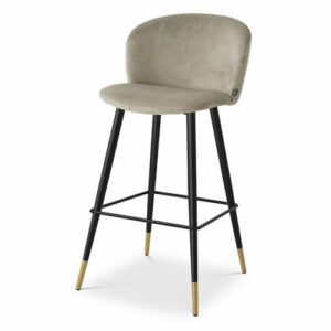 Designer Counter Stool Volante by Eichholtz available in various colours and fabric finishes. Legs are finished in black and gold