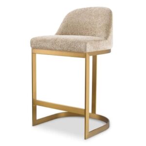 Designer Counter Stool Condos by Eichholtz in lyssa sad upholstery and a brushed brass finish frame