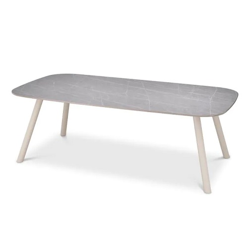 Outdoor Dining Table Nassau S by Eichholtz in sand finish with light grey ceramic table top look