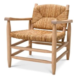 Chair Elliott by Eichholtz in a natural finish with a natural woven seagrass rush. Also available in a classic black finish